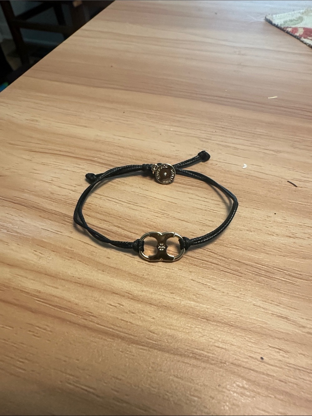 Tory Burch black cord bracelet